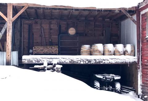 Casks blanketed with snow in the winter