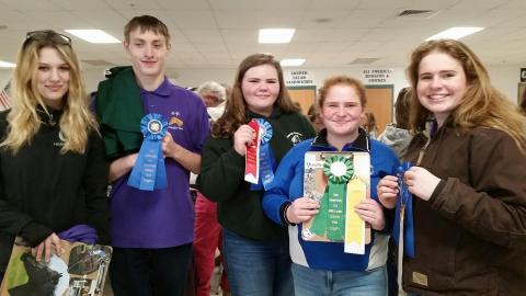 4-H youth with ribbons at State Horse Quiz Bowl Event