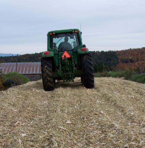 tractor packing corn silage