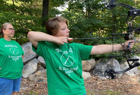 Leah Gonthier shooting while mom Darcy looks on