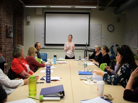 Sarah Grosvenor teaching a class of adults about STEM 