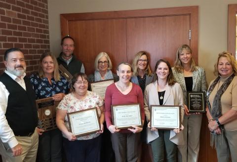 Extension staff members old up awards