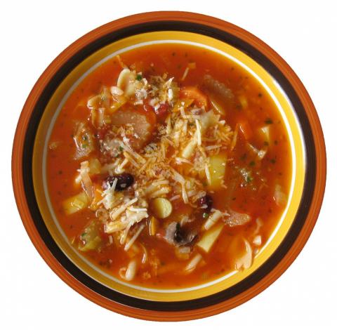 Top view of a bowl of minestrone soup