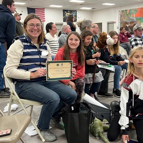 volunteer receiving a certificate